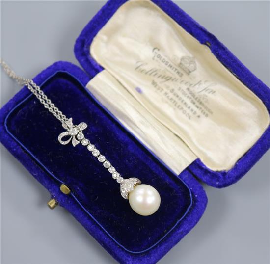 A 1920s, platinum, cultured? pearl and diamond set drop pendant necklace, pendant 40mm.